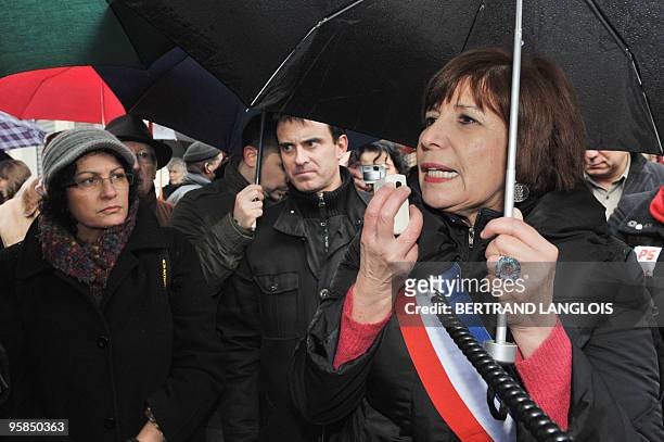 Paris deputy mayor in charge of equality between women and men, Fatima Lalem , speaks during a protest organized by the Women's rights associations...