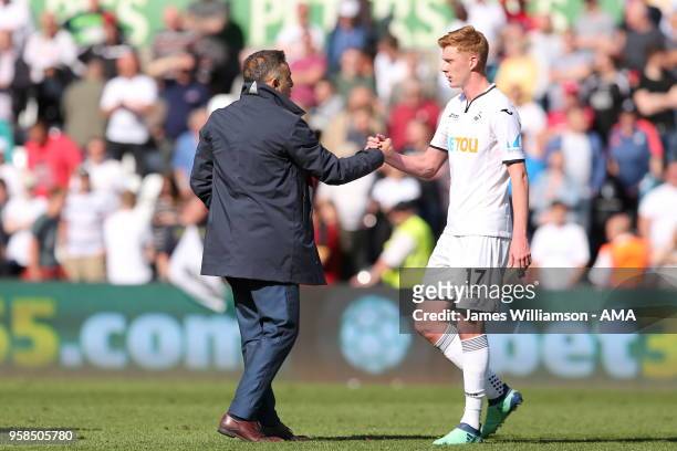 Swansea City manager Carlos Carvalhal and Sam Clucas of Swansea City during the Premier League match between Swansea City and Stoke City at Liberty...