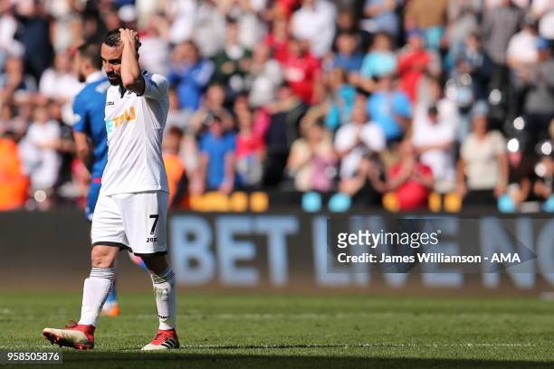 Dejected Leon Britton of Swansea City during the Premier League match between Swansea City and Stoke City at Liberty Stadium on May 13, 2018 in...