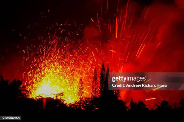 Lava and smoke explodes from Fissure 17 at Leilani Estates in the aftermath of eruptions from the Kilauea volcano on Hawaii's Big Island, on May 13,...