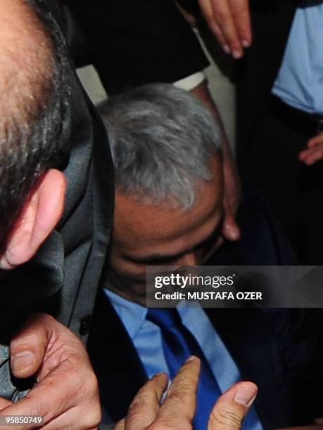 Turk Mehmet Ali Agca who attempted to kill pope John Paul II on May 13 is surrounded by the press after collapsing on January 18, 2010 in Ankara...