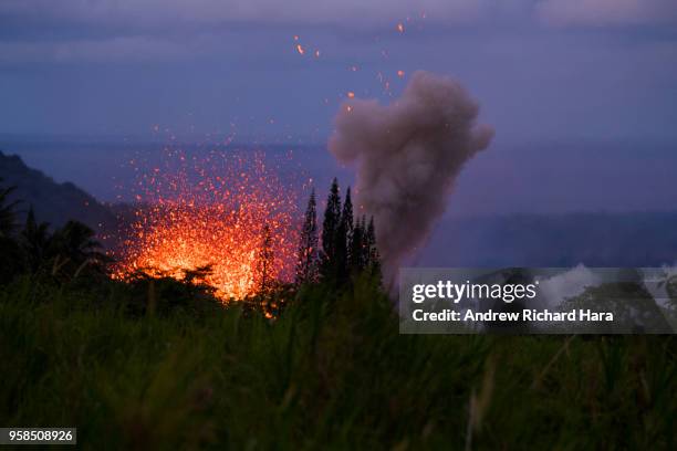 Lava and smoke explodes from Fissure 17 at Leilani Estates in the aftermath of eruptions from the Kilauea volcano on Hawaii's Big Island, on May 13,...