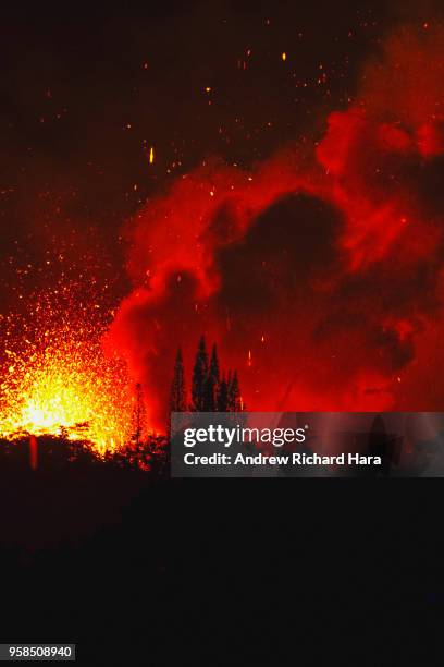 Lava and smoke explodes from Fissure 17 at Leilani Estates in the aftermath of eruptions from the Kilauea volcano on Hawaii's Big Island, on May 13,...