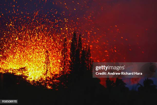 Lava and smoke explodes from Fissure 17 at Leilani Estates in the aftermath of eruptions from the Kilauea volcano on Hawaii's Big Island, on May 13,...