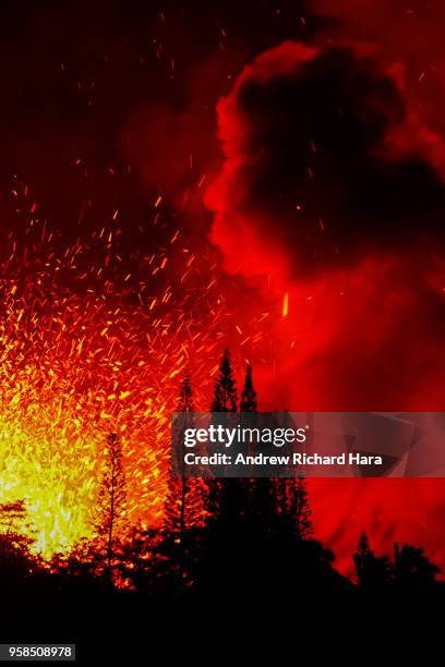 Lava and smoke explodes from Fissure 17 at Leilani Estates in the aftermath of eruptions from the Kilauea volcano on Hawaii's Big Island, on May 13,...