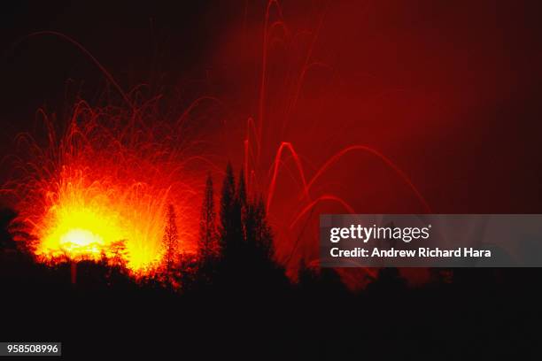 Lava and smoke explodes from Fissure 17 at Leilani Estates in the aftermath of eruptions from the Kilauea volcano on Hawaii's Big Island, on May 13,...