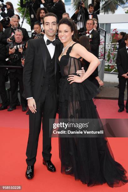 Mohammed Al Turki and Michelle Rodriguez attend the screening of "BlacKkKlansman" during the 71st annual Cannes Film Festival at Palais des Festivals...