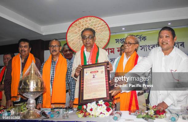 Dr. Nirmal Kumar Choudhury former Vice Chancellor of Gauhati University giving away the 7th Anairam Nunisa Lifetime Achievement Award to Senior...