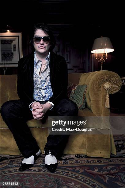 Drummer Ed Graham of The Darkness Band poses for a portrait shoot in Milan on November 20, 2005.