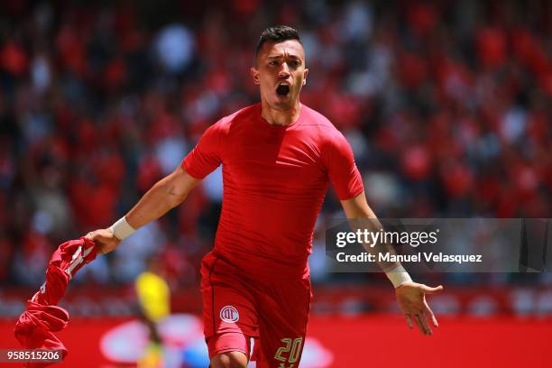 Fernando Uribe of Toluca celebrates after scoring the first goal of his team during the semifinals second leg match between Toluca and Tijuana as...
