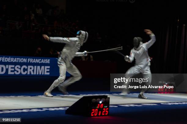 Daniel Berta of Hungary and Kyoungdoo Park of Korea compete during the Team's final of the Men's Epee World Cup, Sncf Reseau Challenge, at Salle...