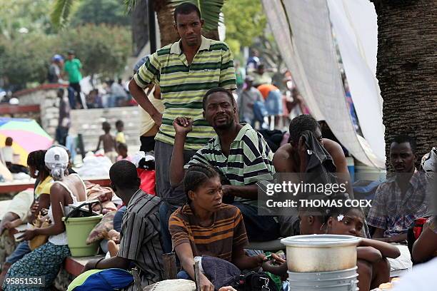 Homeless wait and spend their time outside in the main square in the center of Port-au-Prince, on January 14 following the devastating earthquake...