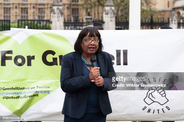 Shadow Chancellor Diane Abbott MP speaks during a protest rally for Grenfell Tower Fire victims in Parliament Square in central London as Members of...