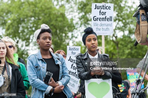 The Grenfell community of survivors, bereaved families and supporters gather in Parliament Square in central London in a peaceful protest as Members...