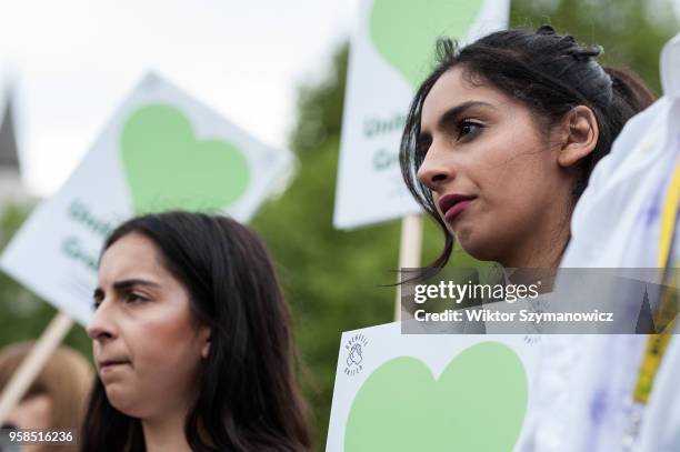 The Grenfell community of survivors, bereaved families and supporters gather in Parliament Square in central London in a peaceful protest as Members...