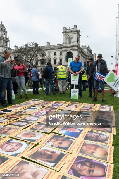 The Grenfell community of survivors, bereaved families and supporters gather in Parliament Square in central London in a peaceful protest as Members...