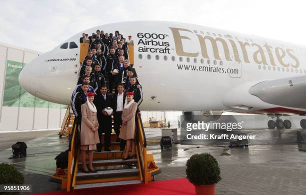 The team of Hamburger SV pose in front of the aircraft during the hand over of the A380 to the Emirates airline on January 18, 2010 in Hamburg,...