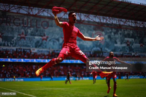 Fernando Uribe of Toluca celebrates after scoring the first goal of his team during the semifinals second leg match between Toluca and Tijuana as...