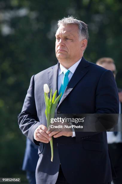 Hungarian Prime Minister Viktor Orban lay flowers at the Monument to the victims of the Smolensk crash in Warsaw, Poland on 14 May 2018