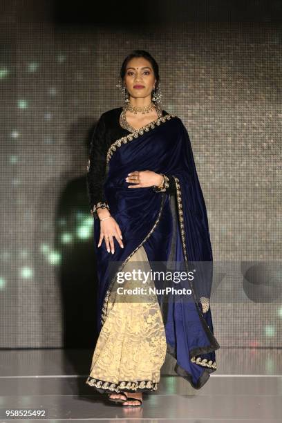 Indian woman wearing an elegant saree during a South Indian fashion show held in Scarborough, Ontario, Canada.