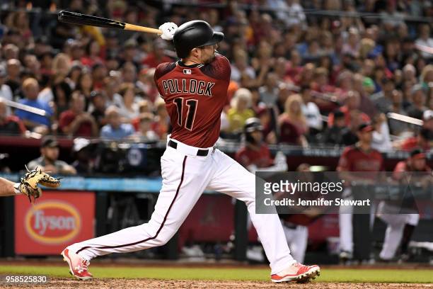 Pollock of the Arizona Diamondbacks triples in the sixth inning of the MLB game against the Houston Astros at Chase Field on May 6, 2018 in Phoenix,...