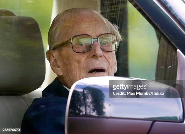 Prince Philip, Duke of Edinburgh seen driving his Land Rover on day 5 of the Royal Windsor Horse Show in Home Park on May 13, 2018 in Windsor,...