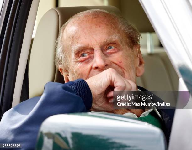 Prince Philip, Duke of Edinburgh seen sitting in his Land Rover on day 5 of the Royal Windsor Horse Show in Home Park on May 13, 2018 in Windsor,...