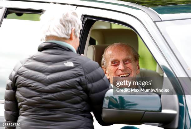 Prince Philip, Duke of Edinburgh seen sitting in his Land Rover on day 5 of the Royal Windsor Horse Show in Home Park on May 13, 2018 in Windsor,...