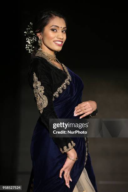 Indian woman wearing an elegant saree during a South Indian fashion show held in Scarborough, Ontario, Canada.