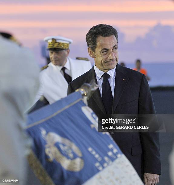 French President Nicolas Sarkozy is seen upon his arrival at Pierrefonds airport in Saint-Pierre de La Reunion island on January 18 as part of a...