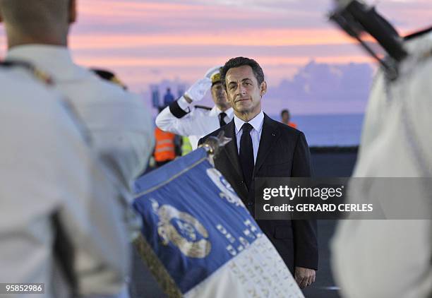 French President Nicolas Sarkozy is seen upon his arrival at Pierrefonds airport in Saint-Pierre de La Reunion island on January 18 as part of a...