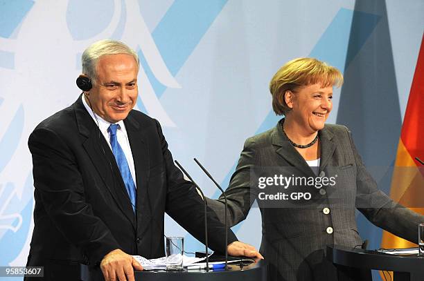 In this handout image supplied by the Israeli Government Press Office , German Chancellor Angela Merkel and Israeli Prime Minister Benjamin Netanyahu...