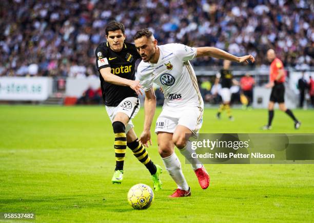 Tarik Elyounoussi of AIK and Sotirios Papagianopoulos of Ostersunds FK competes for the ball during the Allsvenskan match between AIK and Ostersunds...