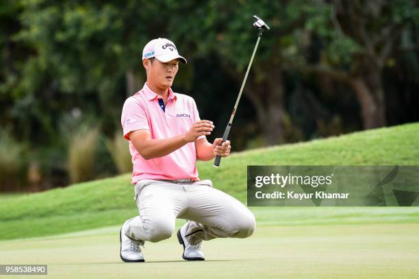 Danny Lee of New Zealand reacts to missing a putt on the 10th hole green during the final round of THE PLAYERS Championship on THE PLAYERS Stadium...