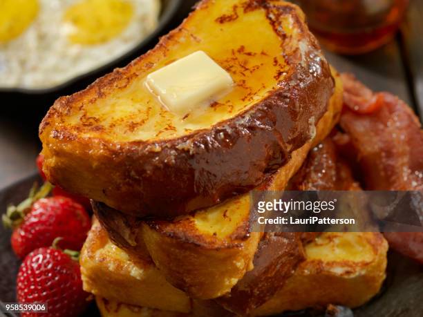 brioche french toast with bacon and eggs - pain perdu stock pictures, royalty-free photos & images
