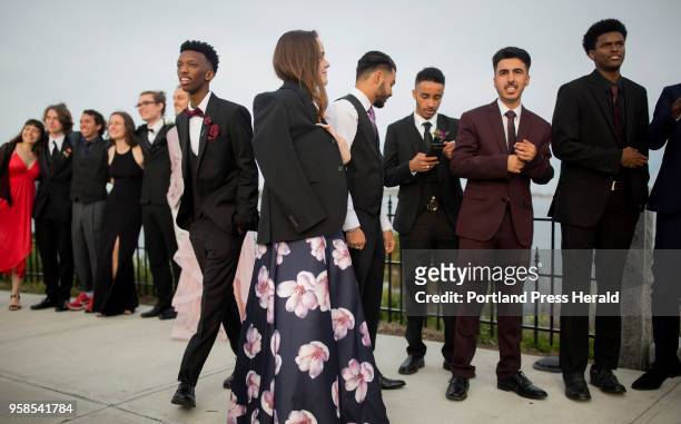 Casco Bay High School students gather to take photos before heading to prom.