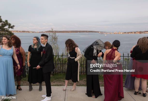 Casco Bay High School students gather to take photos before heading to prom.