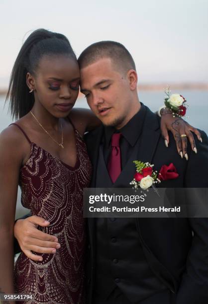 Casco Bay senior Marlin Pamba poses for a portrait with her boyfriend Tariq Assales before her senior prom.