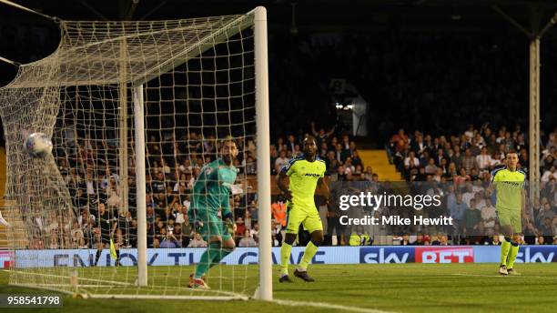 Denis Odoi of Fulham scores his sides second goal past Scott Carson of Derby County during the Sky Bet Championship Play Off Semi Final, second leg...