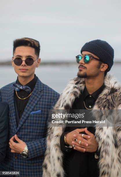 Seniors, from left, Abdullah Kalayaf and Omara Altaee pose for a portrait on the Eastern Promenade in the prom night outfits.