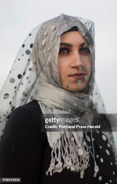 Cacsco Bay senior Mona Abdelkader poses for a portrait on the Eastern Promenade dressed in her outfit for prom night. Abdelkader said she wasn't...