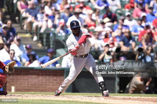 Rusney Castillo of the Boston Red Sox bats against the Texas Rangers at Globe Life Park in Arlington on Sunday, May 31, 2015 in Arlington, Texas. The...