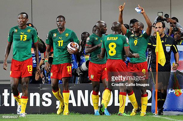 Samuel Eto'o of Cameroon celebrates with his team mates after scoring a goal during the African Nations Cup group D match between Cameroon and Zambia...