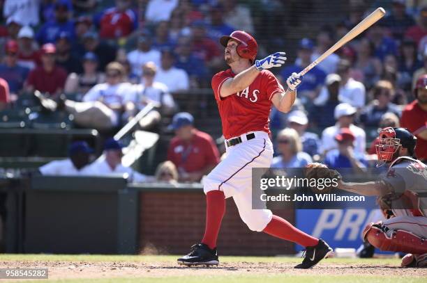 Adam Rosales of the Texas Rangers bats against the Boston Red Sox at Globe Life Park in Arlington on Sunday, May 31, 2015 in Arlington, Texas. The...