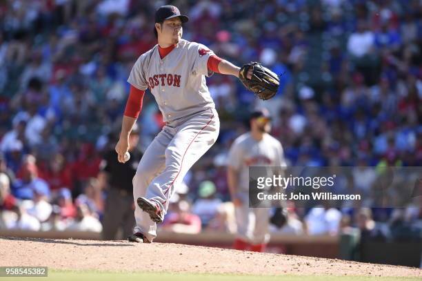 Junichi Tazawa of the Boston Red Sox pitches against the Texas Rangers at Globe Life Park in Arlington on Sunday, May 31, 2015 in Arlington, Texas....