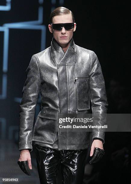 Model walks the runway during the Versace Milan Menswear Autumn/Winter 2010 show on January 18, 2010 in Milan, Italy.