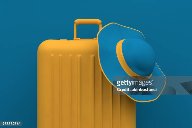 summer travel concept, hat and suitcase on blue background - multi colored hat stock pictures, royalty-free photos & images