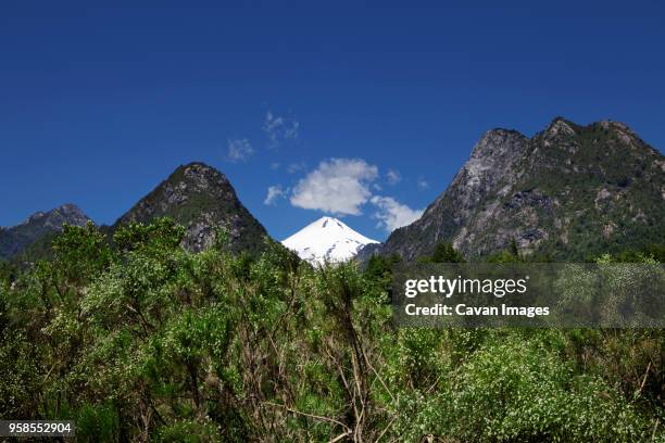 villarrica mountain against sky - villarrica stock pictures, royalty-free photos & images