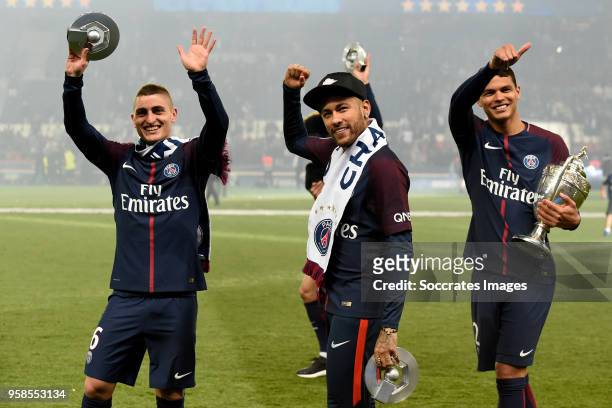 Marco Verratti of Paris Saint Germain, Neymar Jr of Paris Saint Germain, Thiago Silva of Paris Saint Germain celebrates the championship with the...