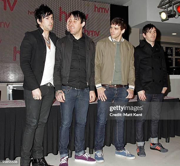 Ian Watkins, Luke Johnson, Stuart Richardson and Mike Lewis of Lostprophets attend an album signing session for their new album 'The Betrayed' at...